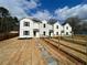 Charming townhomes with classic white siding, dark shutters, and inviting front yards at 229 Evergreen Trl # D, Cartersville, GA 30121