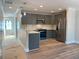 Modern kitchen with stainless steel appliances, sleek countertops, and open layout at 229 Evergreen Trl # D, Cartersville, GA 30121