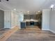 Modern kitchen with gray cabinets, stainless steel appliances, and a convenient island layout at 229 Evergreen Trl # D, Cartersville, GA 30121