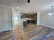 Open floor plan featuring modern kitchen with stainless steel appliances and dining area at 229 Evergreen Trl # D, Cartersville, GA 30121