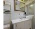 Bathroom featuring toilet, vanity, mirror and open storage at 3948 Bright Star Rd, Douglasville, GA 30135
