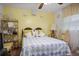 Cozy bedroom featuring yellow walls, unique decor, and a comfortable double bed at 3948 Bright Star Rd, Douglasville, GA 30135