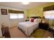 Comfortable bedroom featuring warm-toned walls, soft lighting, and decorative accents at 3948 Bright Star Rd, Douglasville, GA 30135