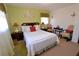 Bedroom featuring warm-toned walls, soft lighting, and decorative accents at 3948 Bright Star Rd, Douglasville, GA 30135
