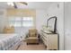 Comfortable bedroom with neutral colors, decorative accents, and natural light for a cozy retreat at 3948 Bright Star Rd, Douglasville, GA 30135