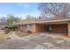 One story brick home with attached carport and walkway at 3948 Bright Star Rd, Douglasville, GA 30135