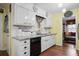 Well-lit kitchen featuring granite countertops, white cabinets, and modern appliances at 3948 Bright Star Rd, Douglasville, GA 30135