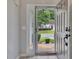 Welcoming entryway with neutral paint, light floors and view of the front lawn at 142 Carl Barrett Dr, Canton, GA 30115