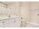 Clean bathroom with white cabinets, a granite countertop, large mirror, tiled floor, and a toilet at 2201 Stratford Commons, Decatur, GA 30033