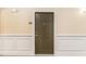 Unit 2201 entry featuring neutral paint, wainscoting, and classic hardware details at 2201 Stratford Commons, Decatur, GA 30033