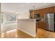 Beautiful kitchen with stainless steel appliances and view to living room at 2201 Stratford Commons, Decatur, GA 30033