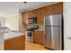 Kitchen featuring stainless steel appliances and ample cabinet space at 2201 Stratford Commons, Decatur, GA 30033