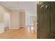 Inviting living area with hardwood floors, crown molding, and an abundance of natural light at 2201 Stratford Commons, Decatur, GA 30033