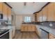 Updated kitchen features granite countertops, stainless steel appliances, and ample cabinet space at 2236 Brannen Se Rd, Atlanta, GA 30316