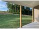 View of the spacious and private backyard from the covered patio at 1209 Lakeside Overlook, Canton, GA 30114