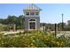 Charming gatehouse featuring stone accents and a stylish roof at 1209 Lakeside Overlook, Canton, GA 30114