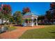 Picturesque gazebo in a town park, surrounded by greenery and benches on a sunny day at 1209 Lakeside Overlook, Canton, GA 30114