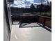 Exterior view of back deck and wooded surroundings at 1350 Cedars Rd, Lawrenceville, GA 30045