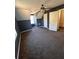 Bedroom with a ceiling fan, natural light, and neutral carpet at 1350 Cedars Rd, Lawrenceville, GA 30045