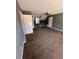Spacious bedroom featuring neutral carpet, ceiling fan, and a window at 1350 Cedars Rd, Lawrenceville, GA 30045