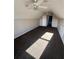 Bright bedroom featuring natural light, ceiling fans and neutral carpet at 1350 Cedars Rd, Lawrenceville, GA 30045