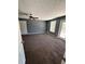 Bright bedroom with a ceiling fan, natural light, and neutral carpet at 1350 Cedars Rd, Lawrenceville, GA 30045