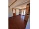 Bright dining room with hardwood floors, a chandelier, and a glass door leading to the backyard at 1350 Cedars Rd, Lawrenceville, GA 30045