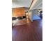 View of the kitchen with sleek countertops and modern appliances, flowing into the open living space at 1350 Cedars Rd, Lawrenceville, GA 30045