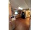 Cozy kitchen featuring wooden cabinets, stainless steel appliances, and a sink with a window at 1350 Cedars Rd, Lawrenceville, GA 30045