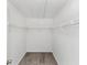 Walk-in closet with wire shelving and carpeted floors at 6422 Pinebark Way, Morrow, GA 30260