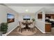 Charming dining area with view to kitchen, perfect for entertaining at 6422 Pinebark Way, Morrow, GA 30260