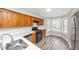 Well-lit kitchen features stainless steel appliances, granite countertops, and a sunlit breakfast nook at 6422 Pinebark Way, Morrow, GA 30260