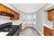 Bright kitchen with natural light, stainless steel appliances, and sleek countertops at 6422 Pinebark Way, Morrow, GA 30260