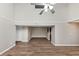 Open living space featuring hardwood floors and abundant natural light at 6422 Pinebark Way, Morrow, GA 30260