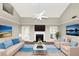 Bright living room with vaulted ceiling, fireplace, and hardwood floors at 6422 Pinebark Way, Morrow, GA 30260