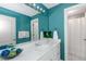 Bright bathroom with a modern vanity, stylish lighting, and decorative accents at 1027 Eagles Brooke Dr, Locust Grove, GA 30248