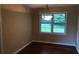 Dining Room featuring hardwood floors and a modern chandelier at 5901 Club Se Dr, Mableton, GA 30126