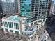 High-rise condo featuring resort-style amenities including a pool and outdoor dining areas at 1080 Peachtree Ne St # 2108, Atlanta, GA 30309