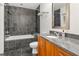 Bathroom featuring a shower over tub combination and modern vanity at 1080 Peachtree Ne St # 2108, Atlanta, GA 30309
