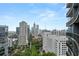 Enjoy breathtaking city views from this high-rise condo, with architectural landmarks and lush trees at 1080 Peachtree Ne St # 2108, Atlanta, GA 30309