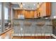 Modern kitchen featuring granite countertops, stainless steel appliances, and stylish barstool seating at 1080 Peachtree Ne St # 2108, Atlanta, GA 30309