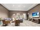 Resident lounge area featuring comfortable sofas, modern decor, and large-screen television at 1080 Peachtree Ne St # 2108, Atlanta, GA 30309