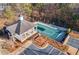 Aerial view of community pool covered for the winter with a gazebo next to parking at 1202 Charleston Ct Cir, Woodstock, GA 30188
