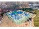 Aerial view of community tennis courts next to landscaped residential area at 1202 Charleston Ct Cir, Woodstock, GA 30188