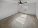 Bright bedroom with a ceiling fan and a window at 3972 Carlinswood Way, Stone Mountain, GA 30083