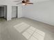 Comfortable bedroom featuring a ceiling fan and closet at 3972 Carlinswood Way, Stone Mountain, GA 30083