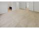 Spacious bedroom featuring plush carpet, a modern ceiling fan, and multiple entryways at 3972 Carlinswood Way, Stone Mountain, GA 30083