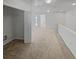 Bright hallway featuring plush carpet and multiple entryways at 3972 Carlinswood Way, Stone Mountain, GA 30083