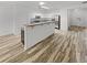 Open kitchen design with breakfast bar and stainless steel appliances at 3972 Carlinswood Way, Stone Mountain, GA 30083