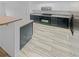 Modern kitchen with dark cabinetry, countertop, and stainless steel appliances at 3972 Carlinswood Way, Stone Mountain, GA 30083
